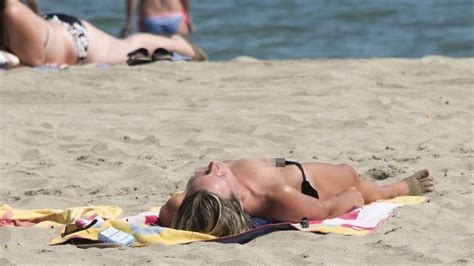 beach topless nude